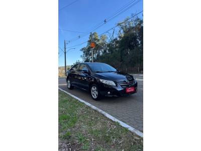 TOYOTA - COROLLA - 2010/2011 - Preta - R$ 63.900,00