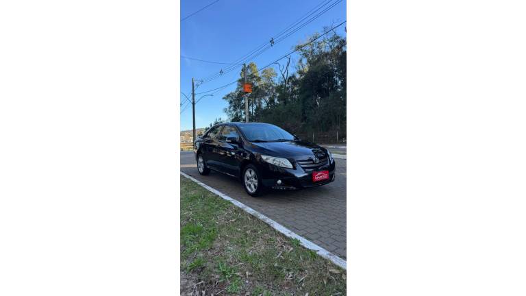 TOYOTA - COROLLA - 2010/2011 - Preta - R$ 63.900,00